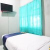 Отель Sepinggan Asri Syariah Guesthouse by OYO Rooms, фото 13