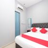 Отель OYO 89436 SZA Inn, фото 4
