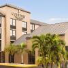 Отель The Palms Inn & Suites, фото 1
