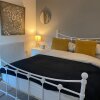 Отель Cosy 2 Bed Flat 1 in Bridgend в Бридженде