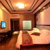 Отель Zhangjiajie Gangyuan Wellness Resort, фото 3