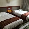 Отель Tiannong Hotel, фото 2