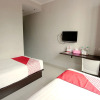 Отель OYO 335 Wisma Empat Lima Syariah, фото 4