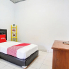 Отель Wisma Amalia Syariah by OYO Rooms, фото 2