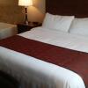 Отель American Inn & Suites, фото 4