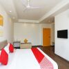 Отель OYO 16340 Yellow Hotels, фото 2