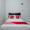 Отель Wisma Syariah by OYO Rooms, фото 7