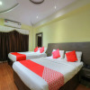 Отель OYO 16385 Mb International, фото 9