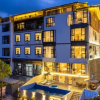 Отель Qianhuan·evelyn·Wangshan Light Luxury Pool Homestay (Libo Xiaoqikong East Gate), фото 1