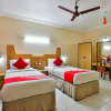 Отель OYO 19952 Hotel Woodlands, фото 6