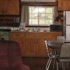 Отель Angells Marina Motel Suites Cabins and Outfitters в Денэр Бич