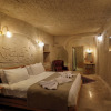 Отель Escape Cave Suites, фото 6