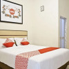 Отель Oyo 1076 Dmc Homestay, фото 6