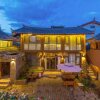 Отель Lijiang Shuhe Xin Huifeng Resort Hotel, фото 1