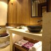 Отель Lijiang Joyful Boutique Hotel в Лицзяне