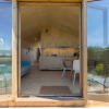 Отель Tiny Wrap-around House on the Edge of Beach, фото 8