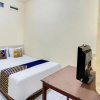 Отель Spot On 91774 Kost Nusantara Sidoarjo, фото 5