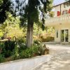 Отель ΝΙRΑSΤΕRΟ - The house in the trees в Гортиной