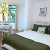 Отель Green Coast Suite, фото 2