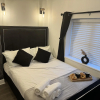 Отель Impeccable 3-bed House in Walsall, фото 12