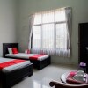 Отель Harmony Homestay Kudus by RedDoorz, фото 3