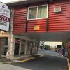Отель Cougar Land Motel, фото 1