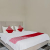 Отель OYO 91585 Ab Homestay Syariah, фото 5