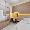 Отель Cozy And Minimalist Studio (No Kitchen) At Aeropolis Apartment, фото 2