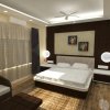 Отель JK Rooms 125 Hotel Mariya International, фото 28