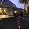 Отель Airport Palms Hotel в Мангере
