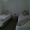 Отель Rustic Manor Bed And Breakfast в Кейптауне