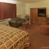 Отель Legacy Inn and Suites, фото 4