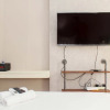 Отель New and Cozy Studio at Patraland Urbano Apartment, фото 4