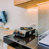 Отель Warm And Simply Look Studio Room At Serpong Garden Apartment, фото 13