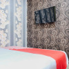 Отель OYO 2595 Hotel Jinan Makassar, фото 8