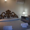Отель Suite Margherita With Private Garden and Shared Pool, фото 2