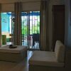 Отель Caribbean Flower Apartments в Виллемстаде