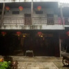 Отель Yangshuo Shijian Gushi Inn, фото 1