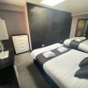Отель Boutique Blackpool 2 Bed Grey Apartment Sleeps 10, фото 9