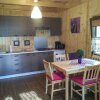 Отель A Holiday Home with a View of Wilkasy Lake. Living Room, 2 Bedrooms, Barbecue, фото 3