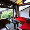 Отель Lijiang Yiran Ethnic Custom Viewing Inn, фото 16