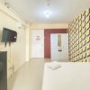 Отель Fancy And Nice Studio At 18Th Floor Bassura City Apartment, фото 11