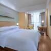 Отель Vienna 3 Best Hotel Wuming Dongming Road, фото 1