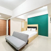 Отель Spacious Studio Room At Vida View Makassar Apartment, фото 12