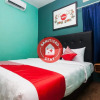 Отель OYO 1052 Sentosa Jaya Guest House Syariah, фото 4