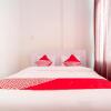 Отель OYO 1557 Bungas Guest House, фото 2
