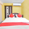 Отель OYO 26579 Ritika Rooms, фото 4