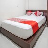 Отель OYO 93477 Almahyra Guest House Syariah, фото 1