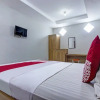 Отель OYO 90883 Ria Agustar Syariah, фото 18