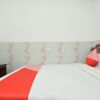 Отель OYO 1480 Villa Dua Putri, фото 13
